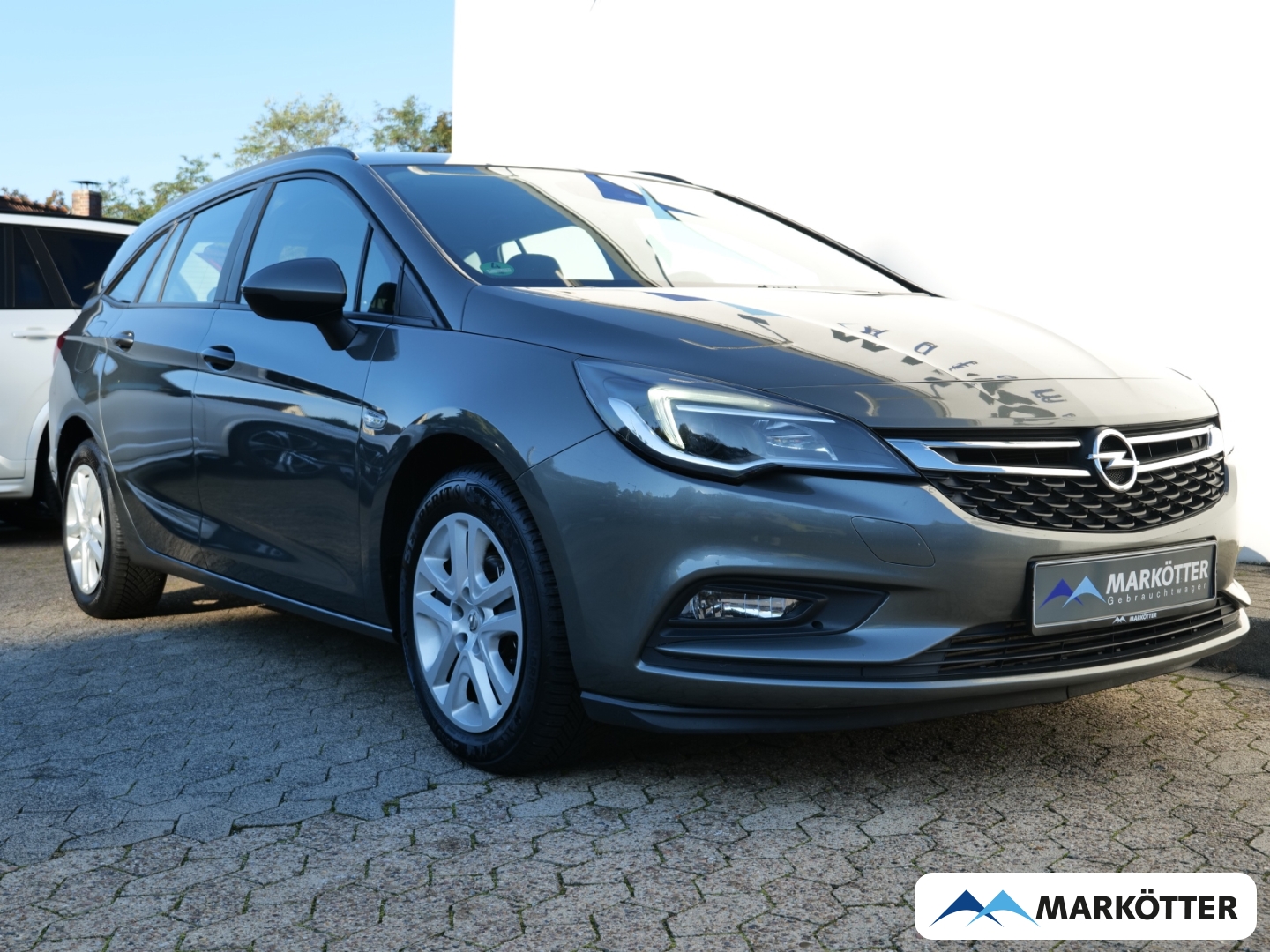 Fahrzeugabbildung Opel Astra K Sports Tourer 1.0 Turbo Edition PDC hin.